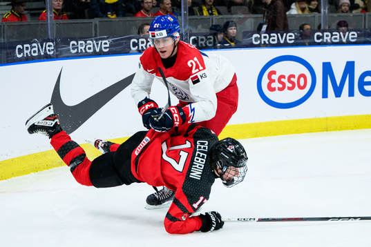 Macklin Celebrini of Canada and Jakub Stancl of Czech