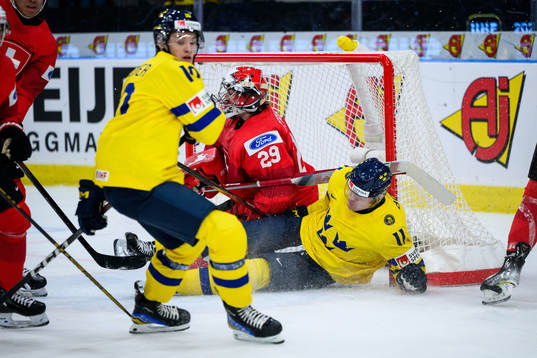 Isac Born of Sweden and goaltender Alessio Beglieri of
