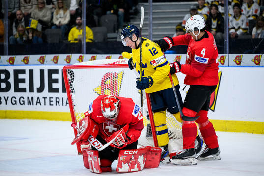Noah Östlund of Sweden against goaltender Alessio Beglieri