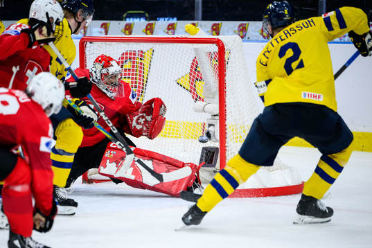 Goaltender Alessio Beglieri of Switzerland and Elias