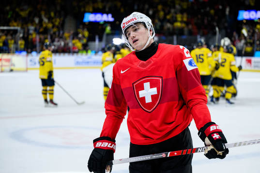Nick Meile of Switzerland looks dejected
