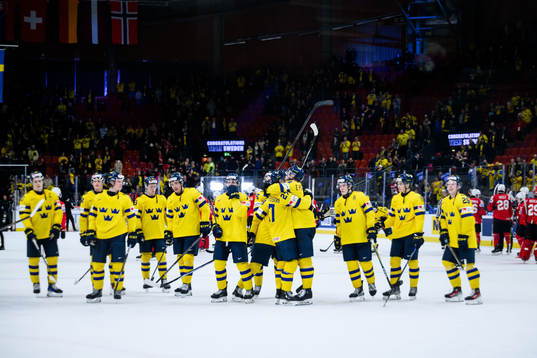 Players of Sweden celebrate