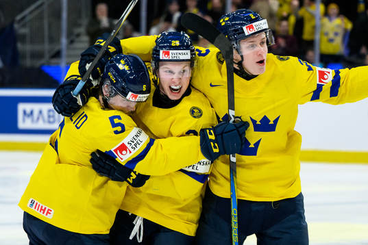 Otto Stenberg of Sweden celebrate with teammates