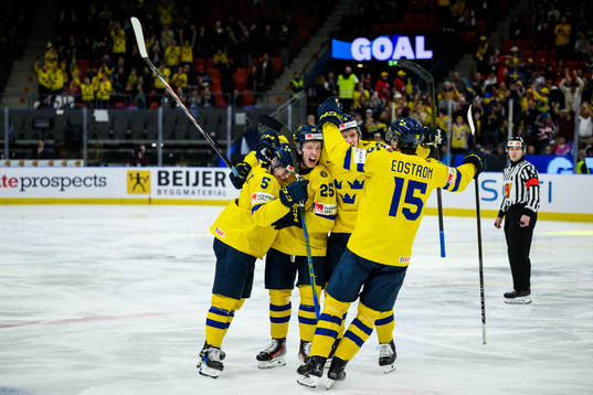 Otto Stenberg of Sweden celebrate with teammates