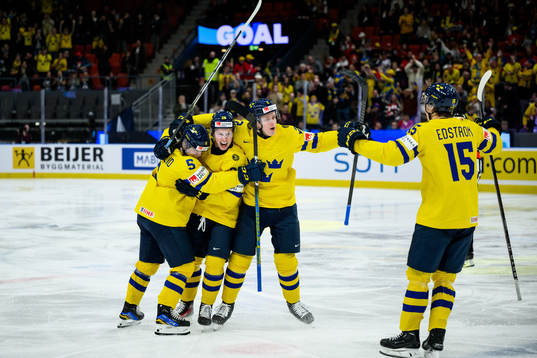 Otto Stenberg of Sweden celebrate with teammates