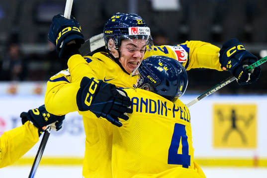 Axel Sandin-Pellikka of Sweden (r) celebrates with Oskar