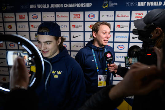 Liam Öhgren and goaltender coach Viktor Alm of Sweden