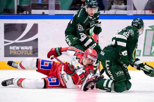 Frölundas Erik Borg och Färjestads Joel Nyström och Per