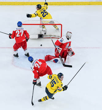 David Edstrom and Otto Stenberg of Sweden celebrate the 1-1