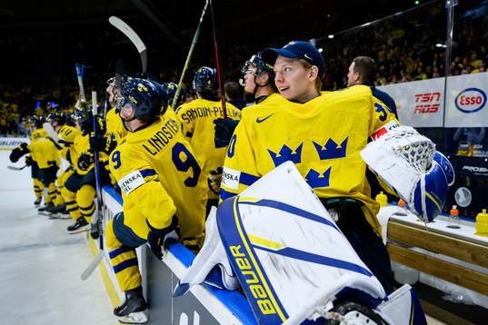 Goaltender Melker Thelin of Sweden celebrates