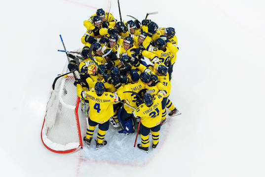 goaltender Hugo Hävelid of Sweden celebrate ith teammates