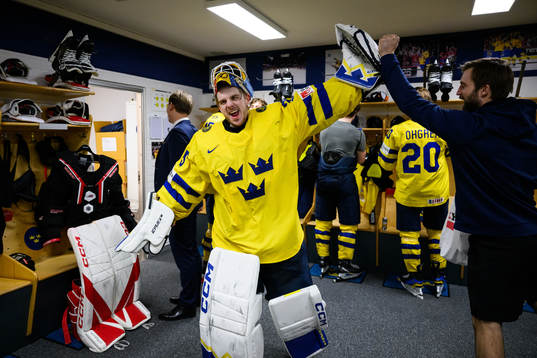 Goaltender Hugo Hävelid of Sweden celebrates