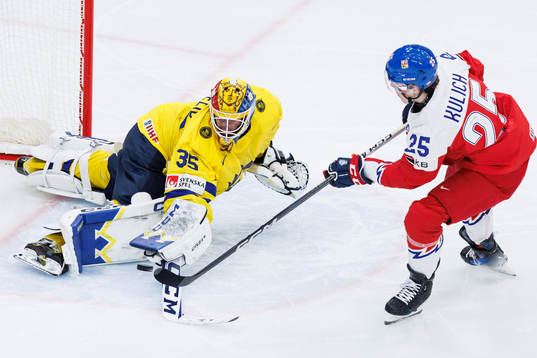 Goaltender Hugo Hävelid of Sweden and Jiri Kulich of Czech