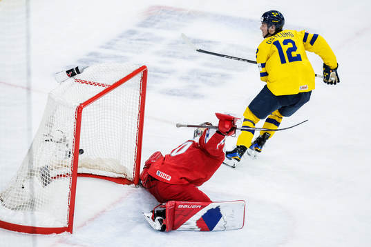 Noah Östlund of Sweden scores the 4-2 goal behind