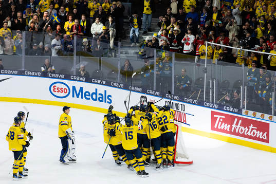 Players of Sweden celebrate