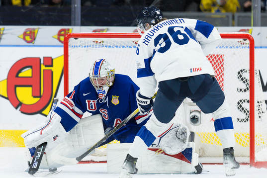 Goaltender Trey Augustine of USA and Janne Naukkarinen of