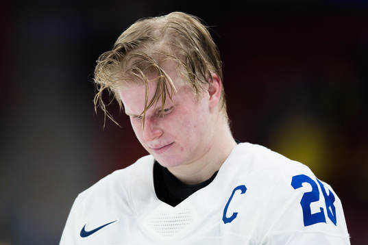 Jere Lassila of Finland looks dejected