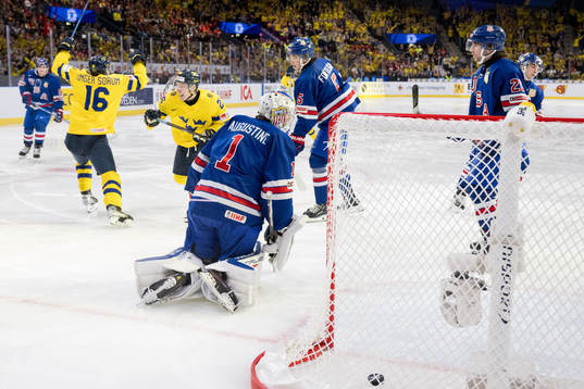 Goaltender Trey Augustine of USA looks dejected