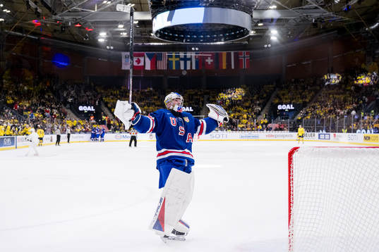 Goaltender Trey Augustine of USA celebrates