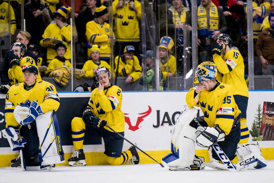 Goaltender Hugo Hävelid of Sweden looks dejected