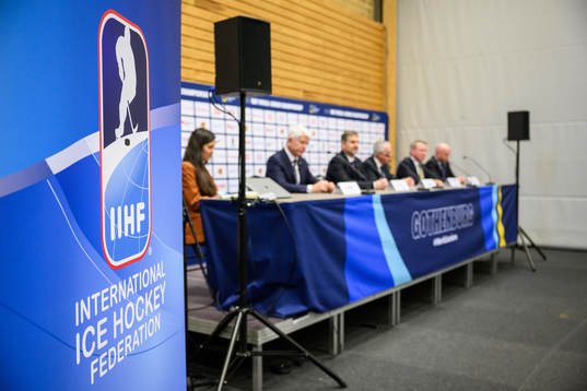 The IIHF logo at a press conference