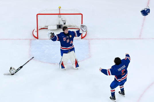 Goaltender Trey Augustine and Drew Fortescue of USA