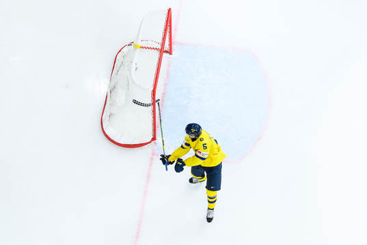 Mattias Hävelid of Sweden breaks his stick