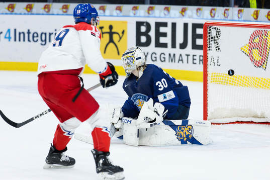 Ondrej Becher of Czech Republic Goaltender Niklas Kokko of