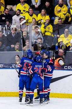 Players of USA celebrate with Rutger McGroarty