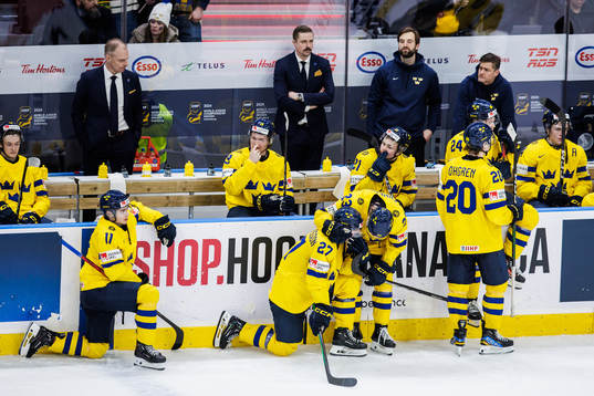 Players of Sweden look dejected