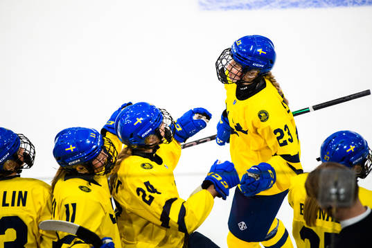 Isabelle Leijonhielm of Sweden celebrates with teammates