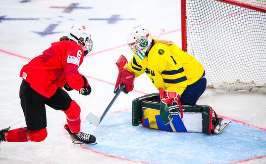 Ivana Wey of Switzerland and Goalkeeper Maja Helge of Sweden