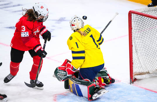 Giulia Romerio of Switzerland and Goalkeeper Maja Helge of