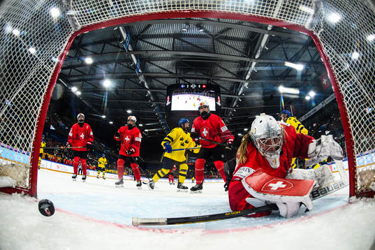 Isabelle Leijonhielm of Sweden scores 3-0 behind goaltender