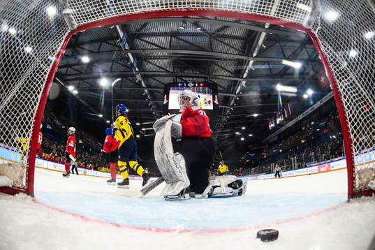 Goaltender Talina Benderer of Switzerland looks dejected