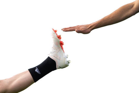 Johan Karlsson (foot ) and Joakim Persson (hand) of the