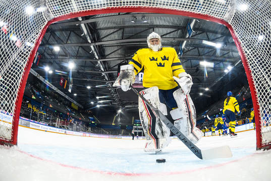Goaltender Lovisa Lundström of Sweden looks dejected