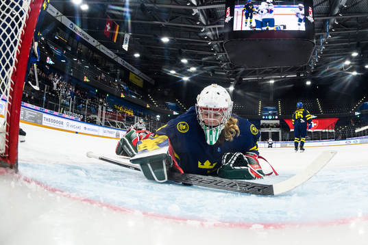 Goaltender Maja Helge of Sweden look dejected