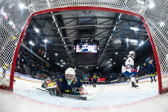 Goaltender Maja Helge of Sweden look dejected