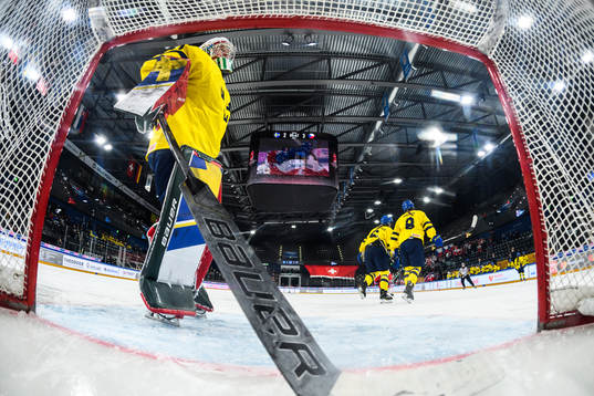 Goaltender Maja Helge of Sweden looks dejected