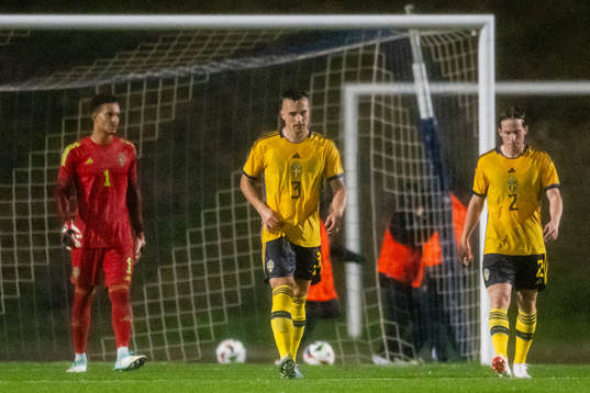 Goalkeeper Oliver Dovin , Henrik Castegren and Johan