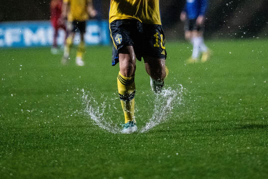 Nahir Besara of Sweden in a water puddle