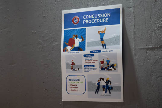 A sign about concussion procedure in UEFA games