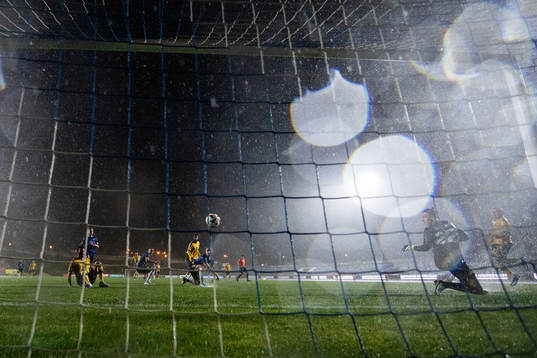 Sebastian Nanasi of Sweden scores 1-1 behind goalkeeper