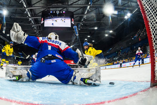 Ella Hellman of Sweden scores 1-0 behind goaltender Livia