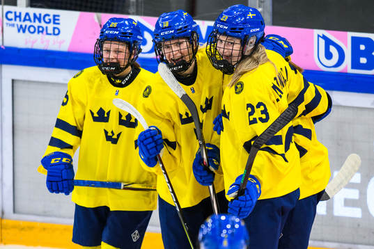 Jenna Raunio of Sweden (not in picture) celebrates scoring