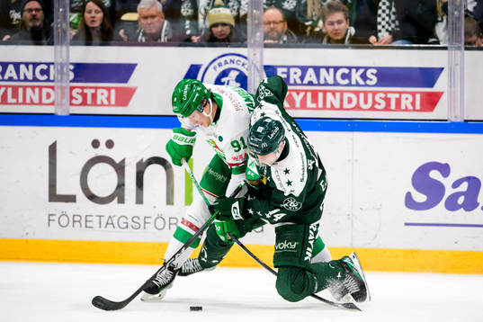 Rögles Adam Tambellini och Färjestads Victor Ejdsell