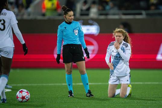 Referee Iuliana Demetrescu and Celina Ould Hocine of Paris
