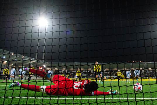 Chiamaka Nnadozie of Paris FC saves a penalty kick from