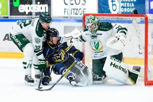 Färjestads Magnus Nygren och HV71s Måns Lindbäck och